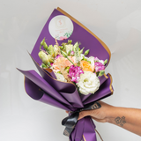 Purple and gold papel wrap bouquet 